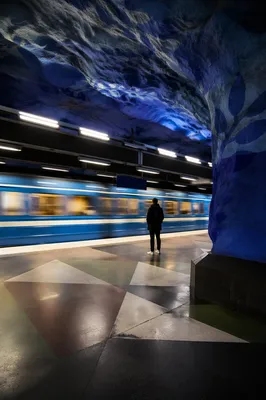Solitary Commuter on Cave Metro Platform