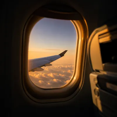 Sunset View Through Airplane Window