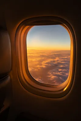 Sunset View Through Airplane Window