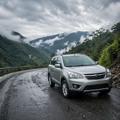 Silver SUV on Misty Mountain Road