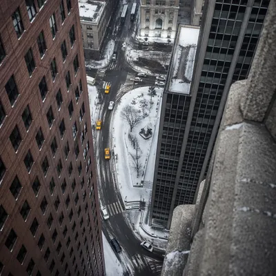 Snowy Downtown Street with Yellow Taxis