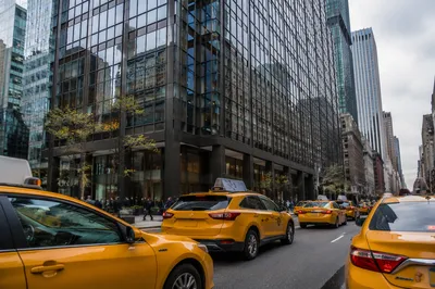 Yellow Taxi Cabs on Downtown Street
