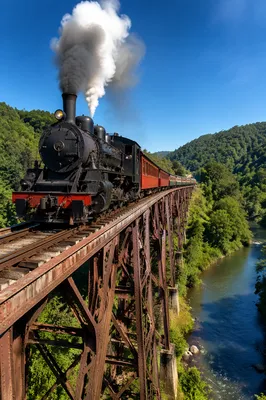 Vintage Steam Train Crossing River Bridge