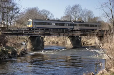 Regional Train Crossing Rural River Bridge