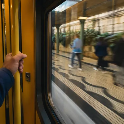 Commuters Seen Through Moving City Train