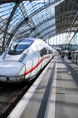 High-Speed Train at Busy City Platform