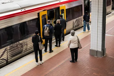 Urban Commuters Waiting at Train Platform