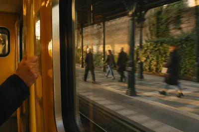 Commuters Passing a City Train Platform