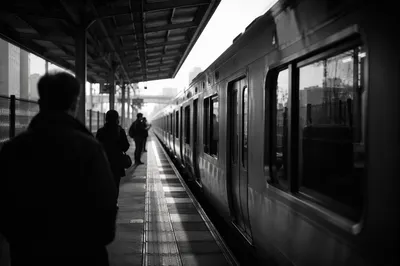Quiet Morning Commuters on Urban Train Platform