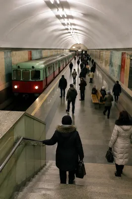 Busy Underground Train Platform From Stairway