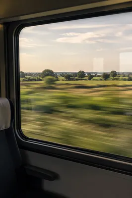 Countryside Journey Through a Train Window
