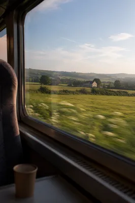 Quiet Train Window Over Morning Countryside