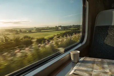Quiet Train Window Across Morning Countryside