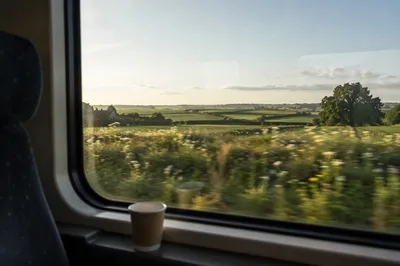 Quiet Train Window View of Countryside