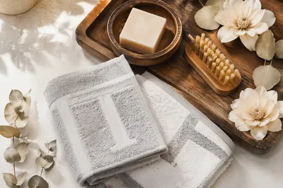 Folded Bamboo Towels with Rustic Spa Essentials