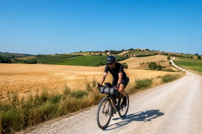Cyclist Riding Countryside Road for Wellness