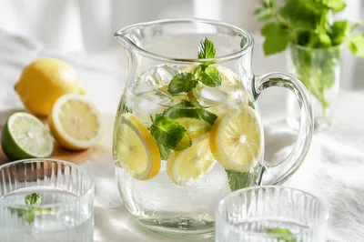 Citrus Infused Water Pitcher on White Linen