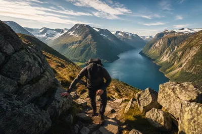 Hiker Climbing Rugged Mountain Trail