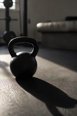 Dramatic Kettlebell on Morning Gym Floor