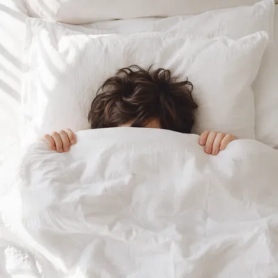 Peaceful Morning Rest in White Bedding