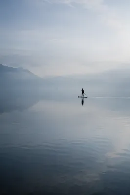 Morning Paddle Board on Calm Misty Lake