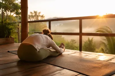 Peaceful Sunrise Yoga Stretch on Balcony